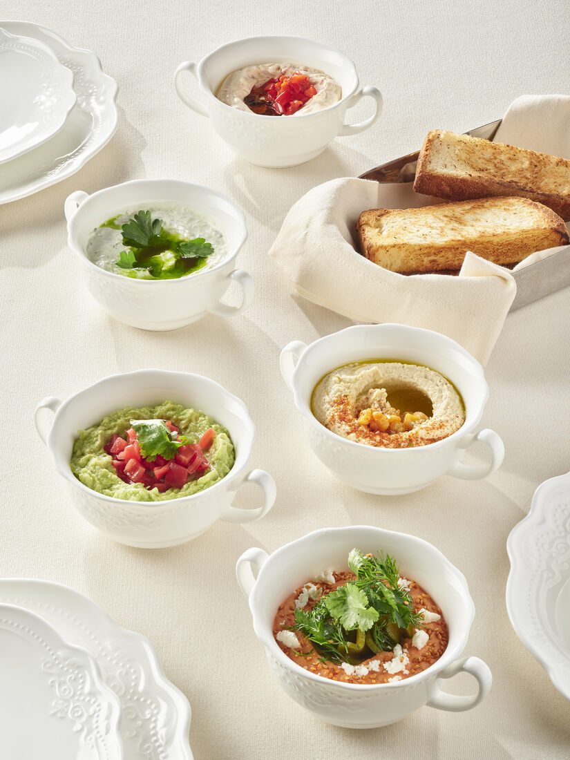 Selection of house-made dips and spreads — guacamole, hummus and seasonal preparations