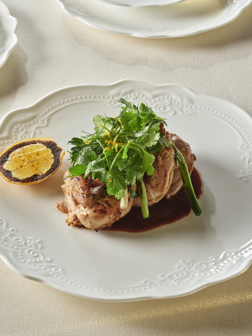 Chicken supreme with herbs, citrus and red wine reduction